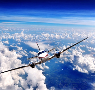 Plane Over The Clouds - Obrázkek zdarma pro 2048x2048
