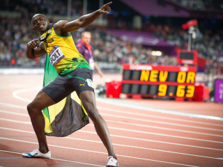Das Usain Bolt won medals in the Olympics Wallpaper 320x240