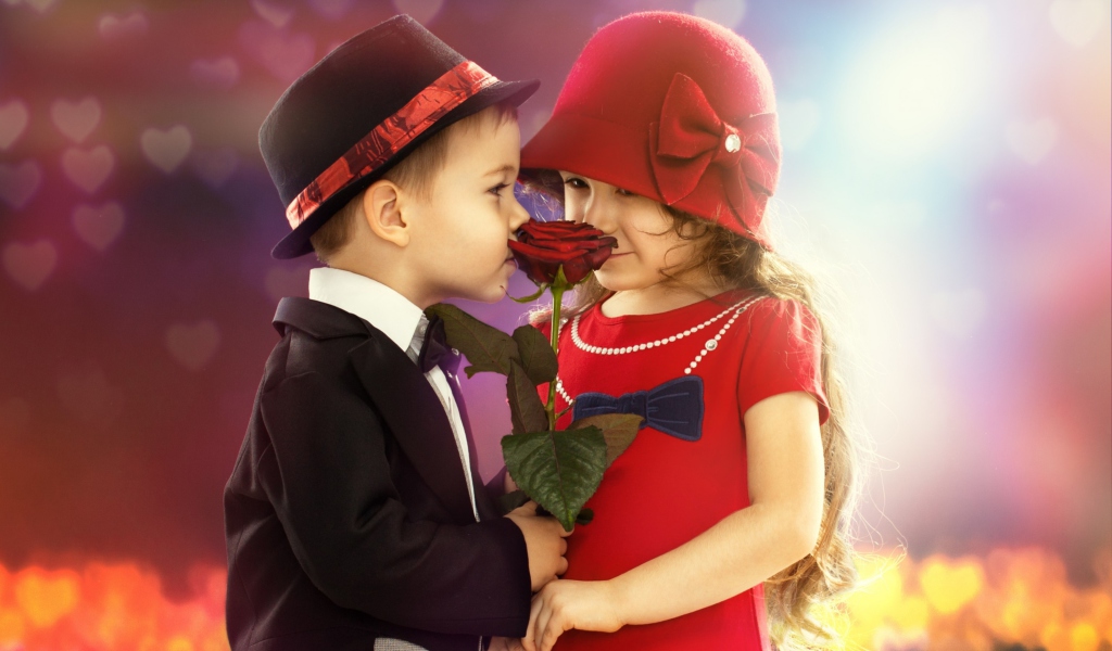 Cute Kids Couple With Rose wallpaper 1024x600