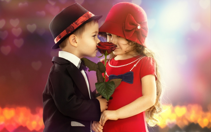 Cute Kids Couple With Rose wallpaper