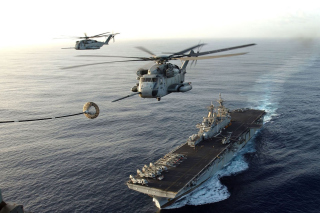 Aircraft Carrier And Helicopter - Obrázkek zdarma pro 720x320