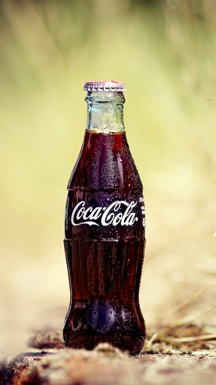 Das Coca Cola Soft Drink Wallpaper 750x1334