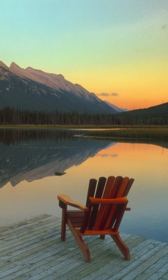 Screenshot №1 pro téma Wooden Chair With Pieceful Lake View 240x400