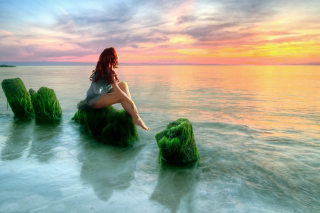 Mermaid On Stone Background for Android, iPhone and iPad