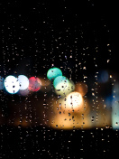 Sfondi Raindrops on Window Bokeh Photo 132x176