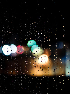 Raindrops on Window Bokeh Photo wallpaper 240x320