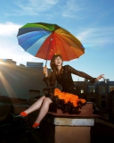 Screenshot №1 pro téma Happy Girl With Rainbow Umbrella 128x160