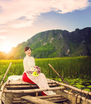 Beautiful Asian Girl With Flowers Bouquet Sitting In Boat - Obrázkek zdarma pro Nokia Asha 308