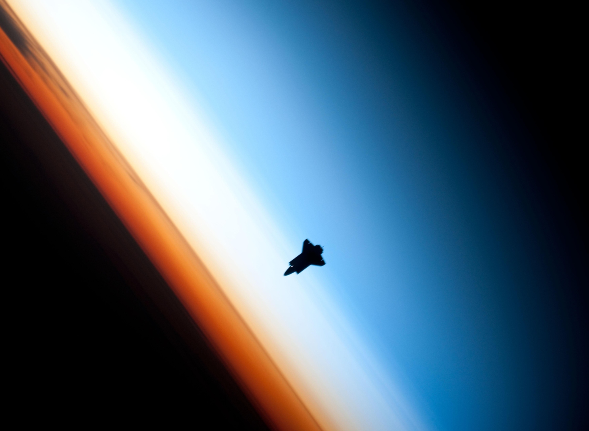 Shuttle In Outer Space wallpaper 1920x1408