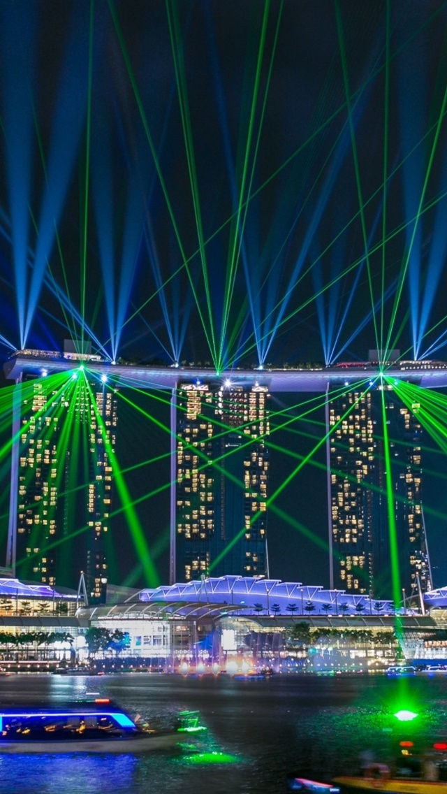 Sfondi Laser show near Marina Bay Sands Hotel in Singapore 640x1136