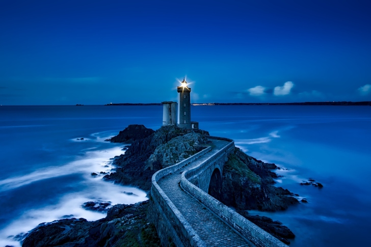 France Lighthouse in Ocean wallpaper