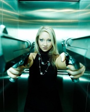 Fondo de pantalla Girl with guns as gangster 176x220