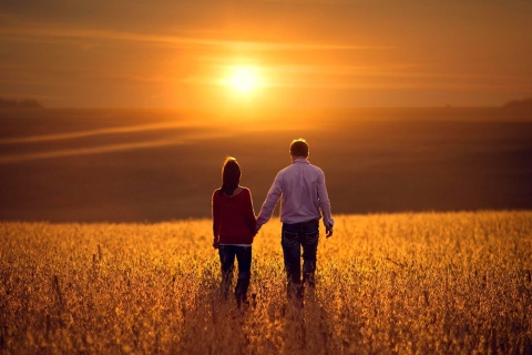 Couple at sunset wallpaper 480x320