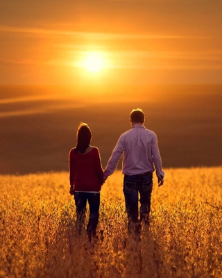 Couple at sunset - Obrázkek zdarma pro 240x400