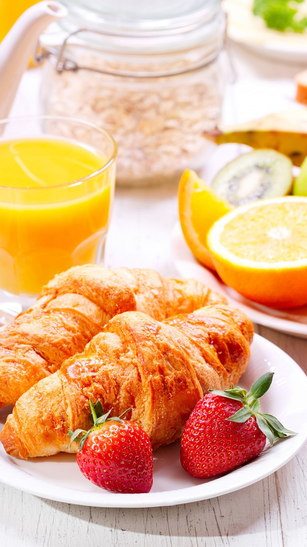 Fondo de pantalla Breakfast with croissants and fruit 1080x1920