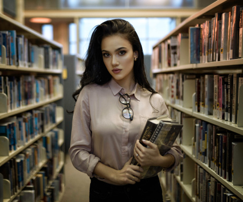 Обои Girl with books in library 480x400