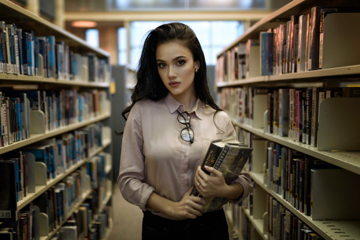 Обои Girl with books in library