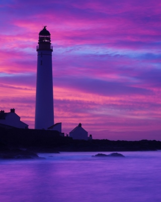 Обои Lighthouse under Purple Sky на Nokia Asha 300