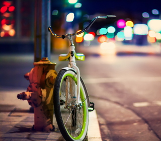 Green Bicycle In City Lights papel de parede para celular para iPad 2
