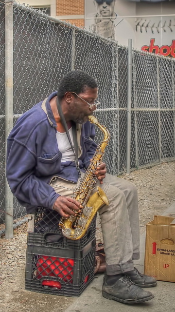 Jazz saxophonist Street Musician wallpaper 360x640