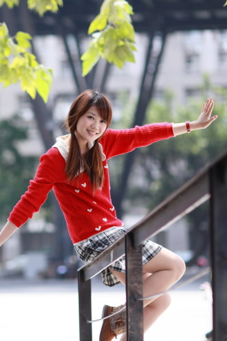 Fondo de pantalla Pretty Asian Girl In Red Jumper 320x480