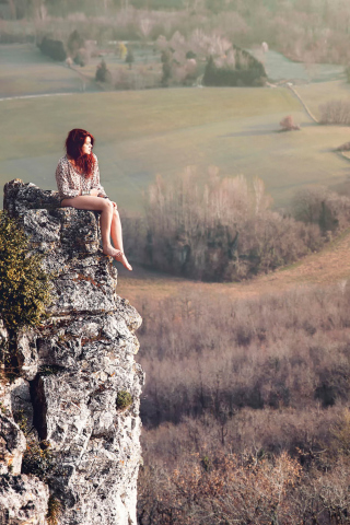Screenshot №1 pro téma Redhead Girl Sitting On Rock 320x480
