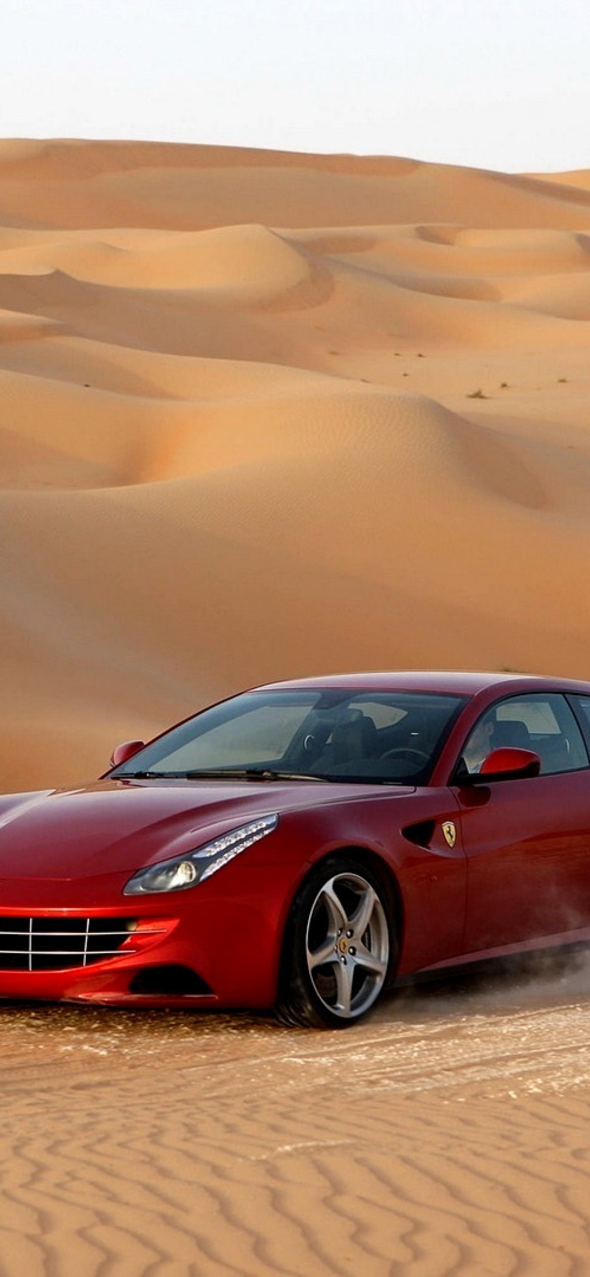 Ferrari FF in Desert wallpaper 1170x2532