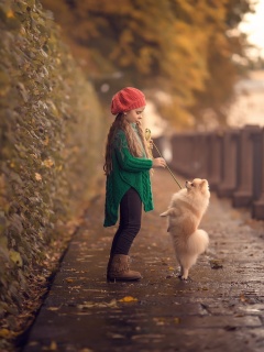 Das Child and dog spitz Wallpaper 240x320