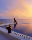 Maldives pool with girl wallpaper 128x160