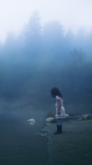 Child Feeding Ducks In Misty Morning wallpaper 360x640