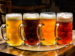 One Liter Beer Mugs wallpaper 320x240