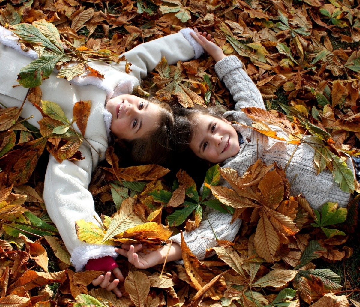 Sfondi Cute Child Girls On Autumn Leaves Carpet 1200x1024