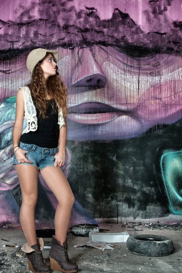Girl In Front Of Graffiti Wall wallpaper 640x960