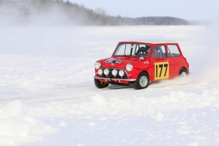 Red Mini In Snow Background for Android, iPhone and iPad