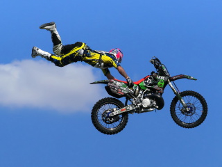 Fondo de pantalla Motorcyclist Ride Jump 320x240