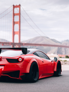 Ferrari 458 Italia near Golden Gate Bridge wallpaper 240x320