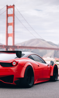 Das Ferrari 458 Italia near Golden Gate Bridge Wallpaper 240x400