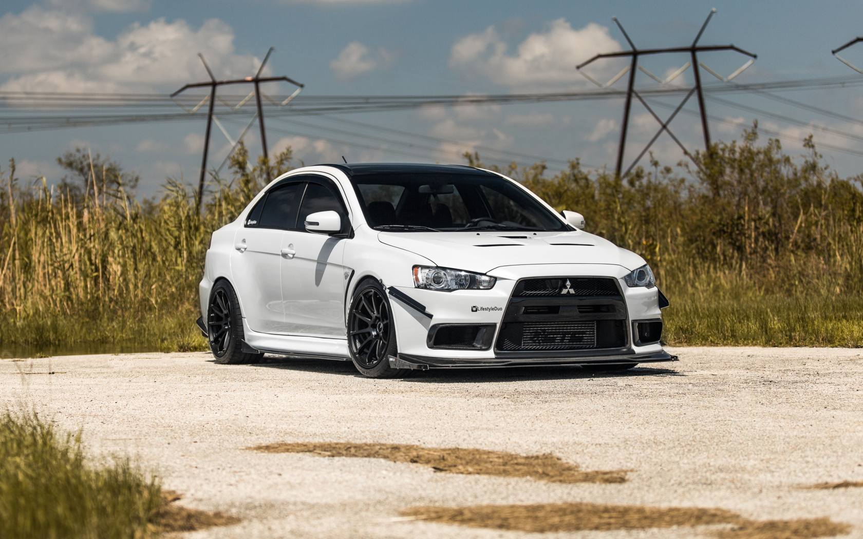 Обои Mitsubishi Lancer Evo XI 1680x1050