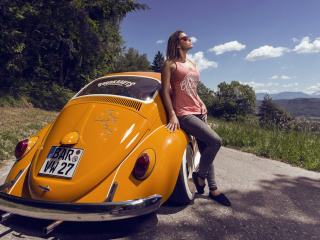 Das Girl with Volkswagen Beetle Wallpaper 320x240