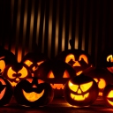 Sfondi Halloween Pumpkins In The Dark 128x128