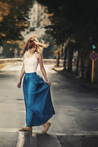Sfondi Girl In Long Blue Skirt On Street 320x480