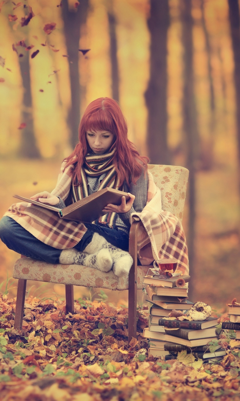 Das Girl Reading Old Books In Autumn Park Wallpaper 768x1280