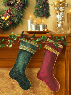 Das Christmas stocking on fireplace Wallpaper 240x320