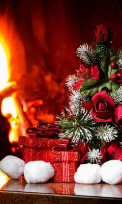 Das Christmas near Fireplace Wallpaper 240x400