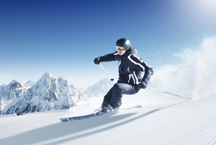 Skiing In Snowy Mountains wallpaper