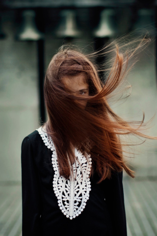 Brunette With Windy Hair wallpaper 320x480