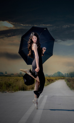 Ballerina with black umbrella wallpaper 240x400