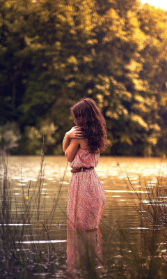 Girl In Summer Dress In River wallpaper 240x400