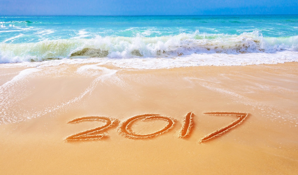 Обои Happy New Year 2017 Phrase on Beach 1024x600