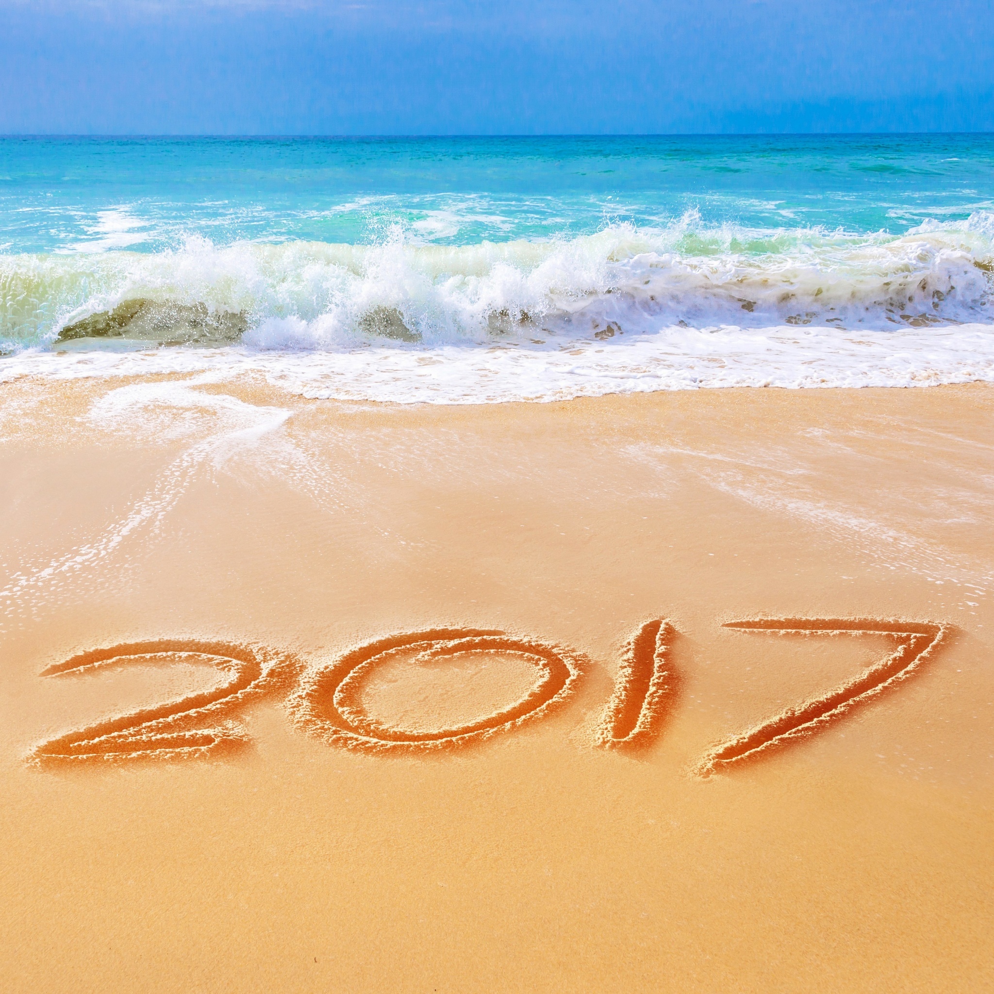 Обои Happy New Year 2017 Phrase on Beach 2048x2048